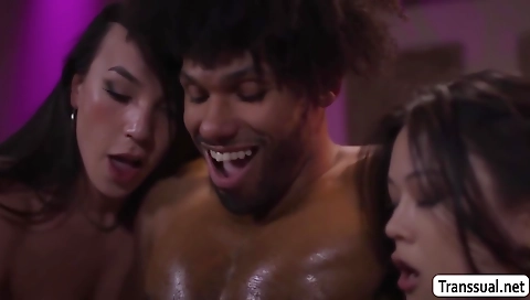 Guy fucks a brunette and two trans-masseuses in the ass