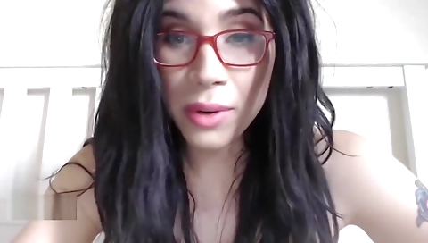 Busty solo shemale shows how to masturbate with a small toy