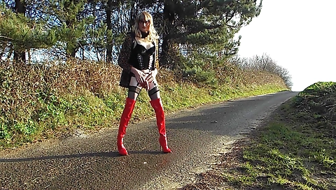 Mature milf is playing with her sexy body outdoors