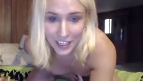 Blonde slut tries her new toy on her face and masturbates
