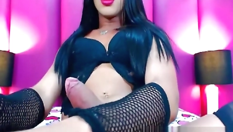 Busty shemale with a fat ass gapes big cock in webcam