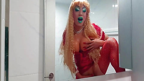 Horny blonde stripper shows her big boobs at the mirror
